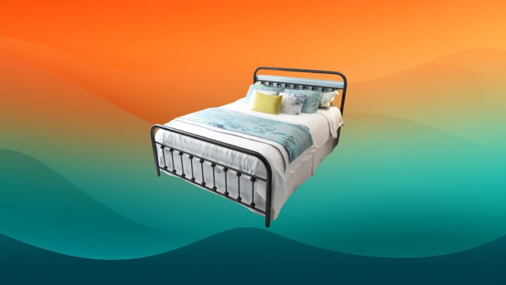 rounded black metal bed frame in front of an orange and teal background