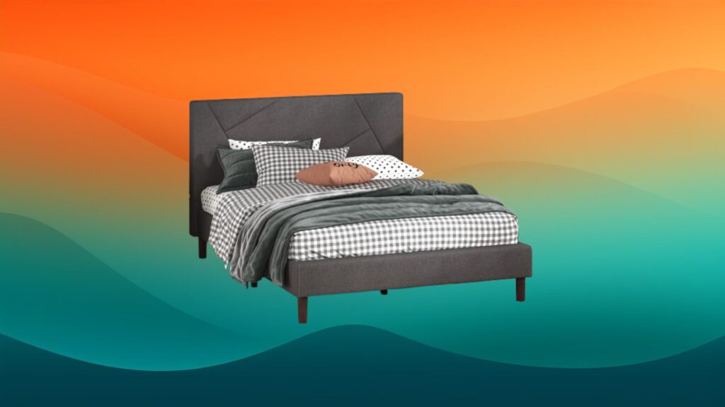 dark gray bed frame with green blankets and pillows on top in front of an orange and teal background