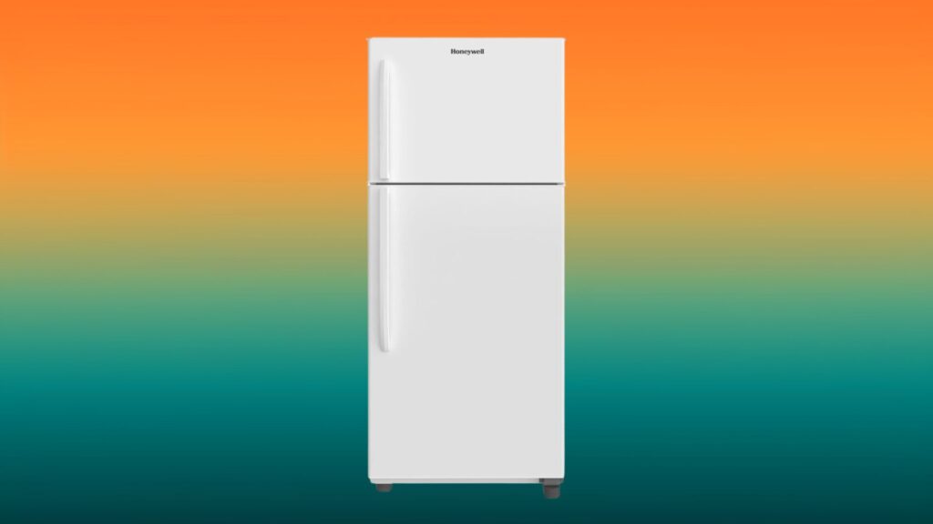 white top freezer fridge in front of an orange and teal gradient background