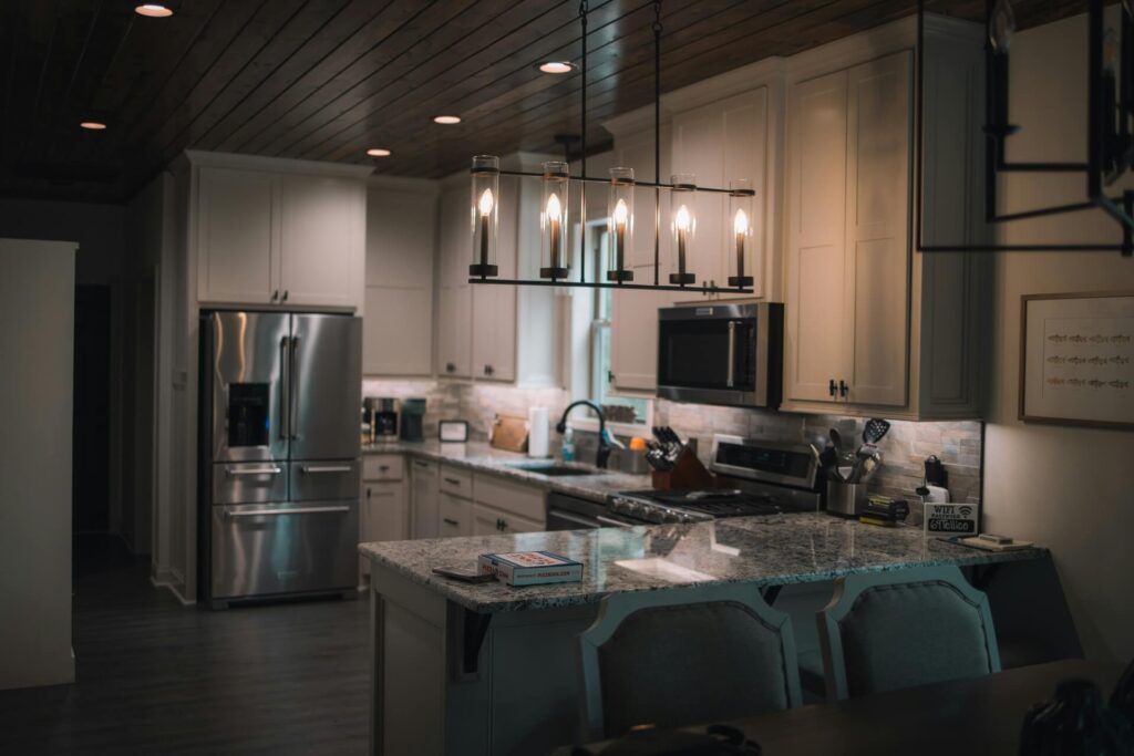 A kitchen with granite countertops.