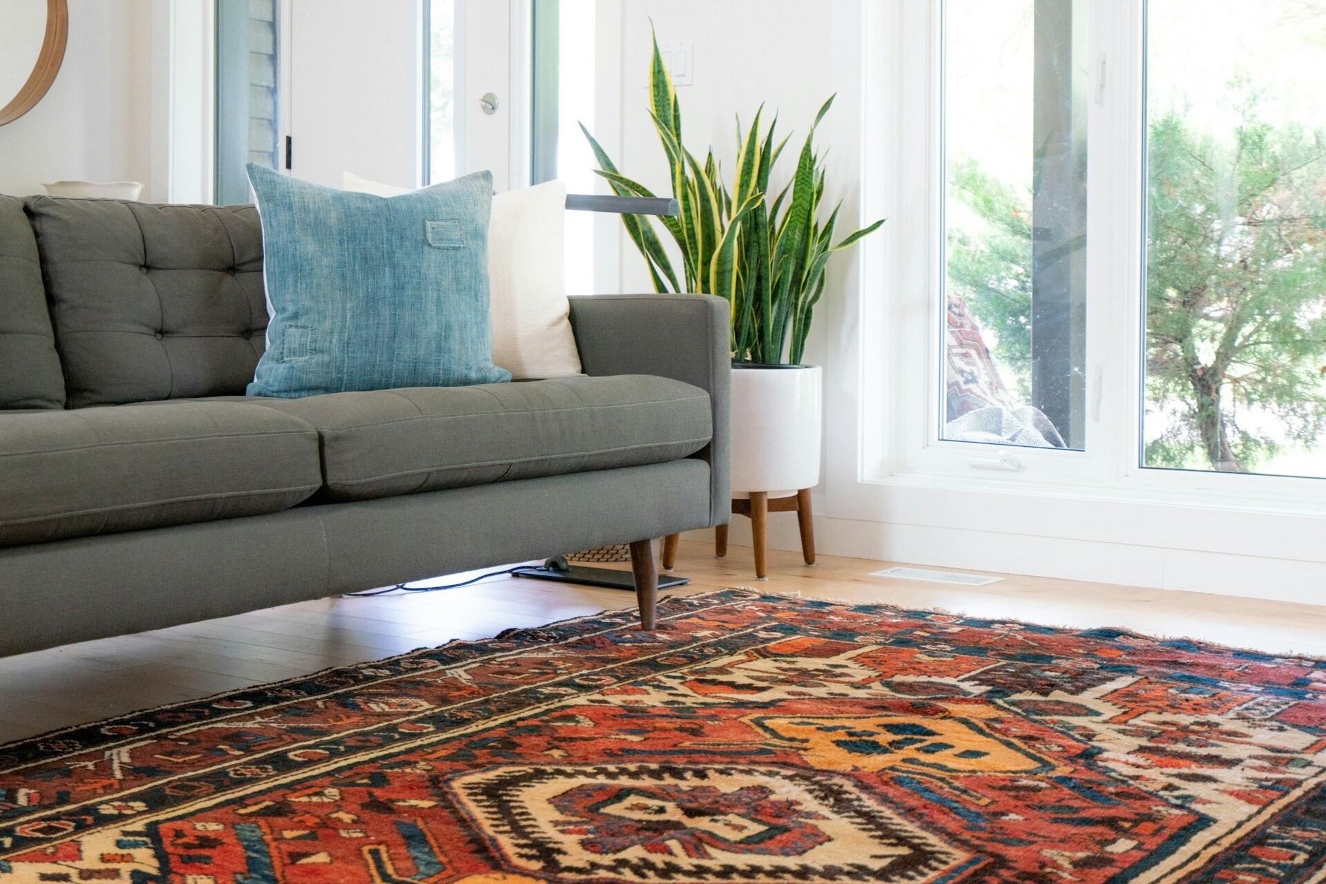 couch and carpet in office guest room