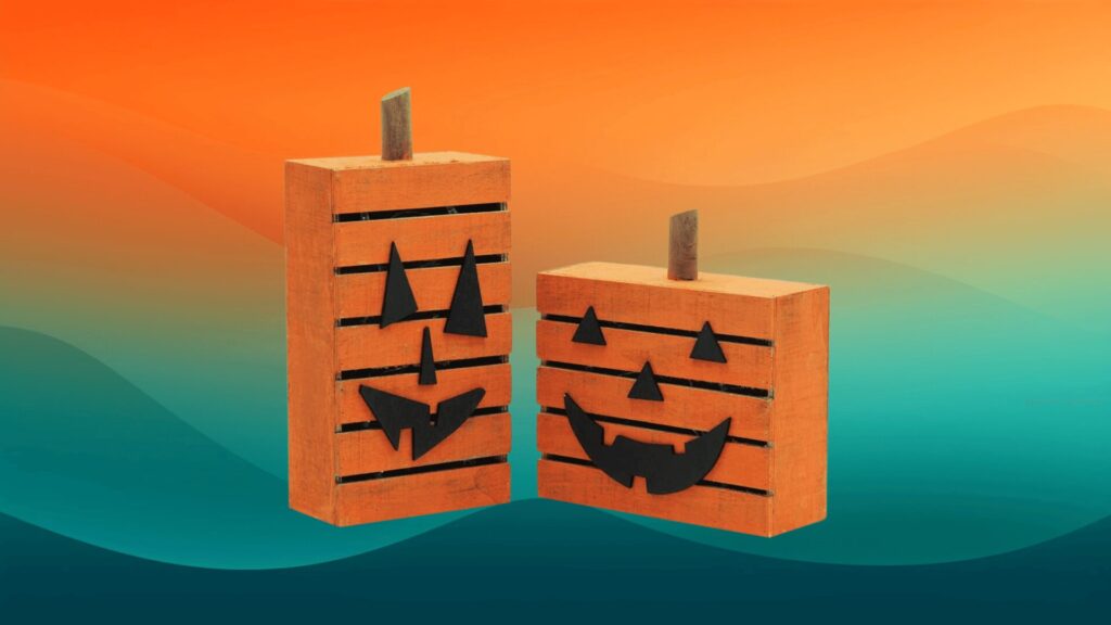 two wooden boxes with pumpkin faces on them in front of an orange and teal background