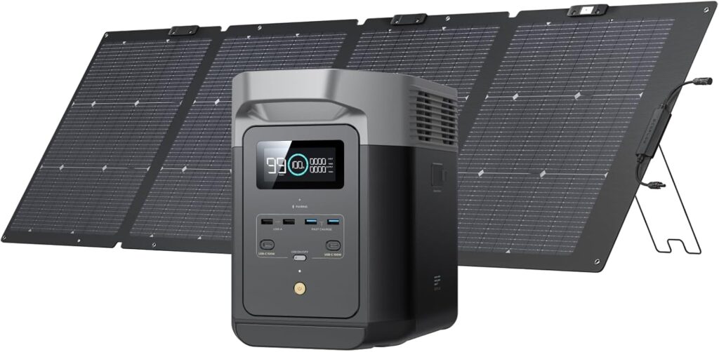 A gray solar power generator sits against its black panel and a white background.