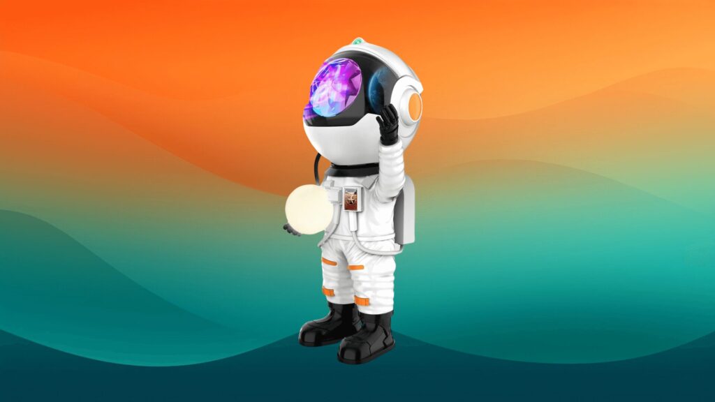 astronaut galaxy projector in front of an orange and teal background