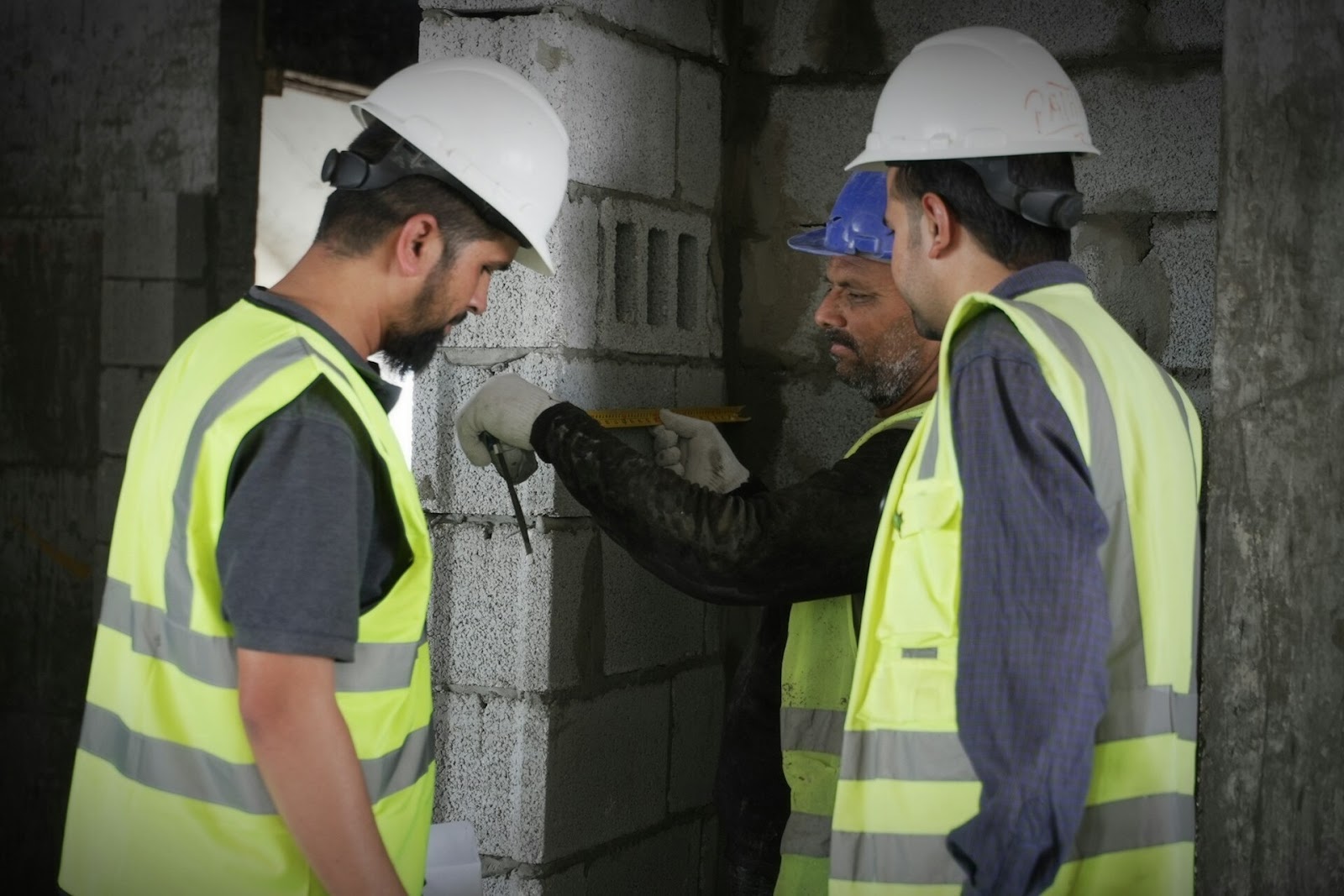 people measuring building block