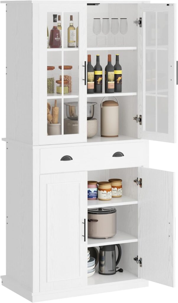 A white pantry organizer cabinet sits against a white background. It has glass panel doors over the top three shelves, a deep drawer in the middle and shelves underneath hidden behind solid white doors.