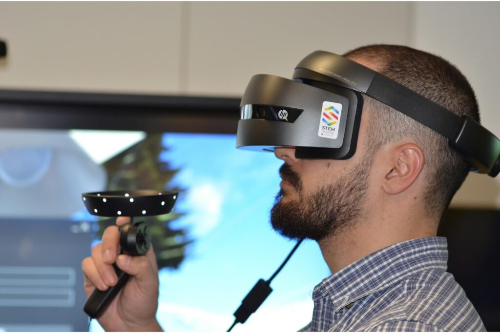 A construction professional wearing a VR headset