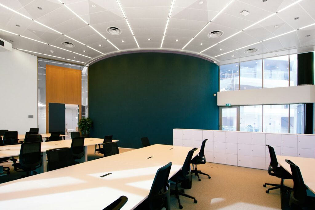 An empty training room with a green wall