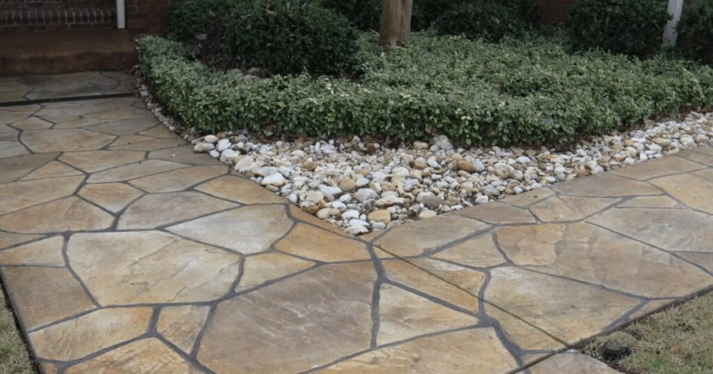 Mixed designs and color stamped cement. The design is by StampItCrete.