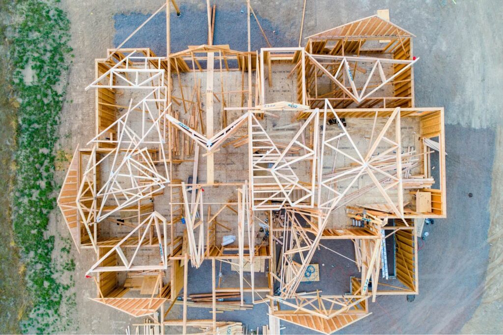 A bird's-eye view of a stick-built house under construction 
