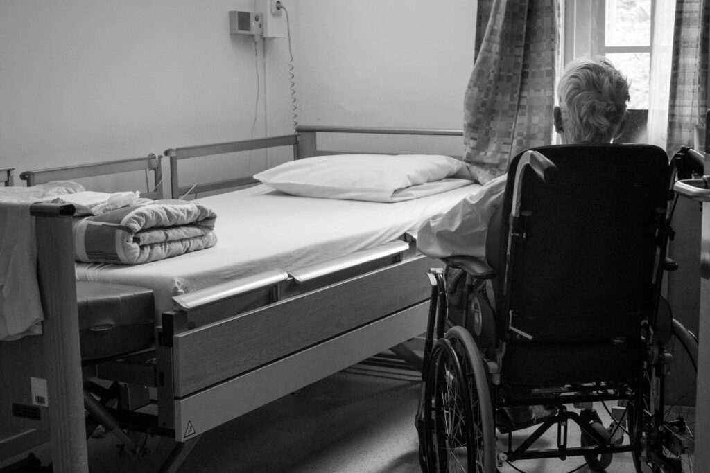 wheelchair near bed