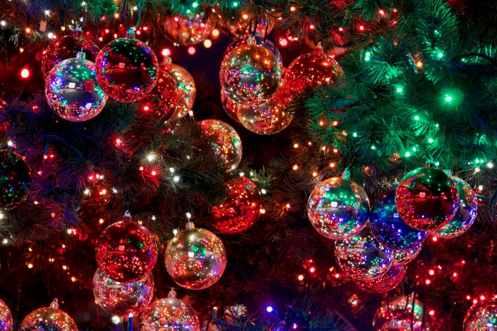 Color glass ornament balls on a Christmas tree