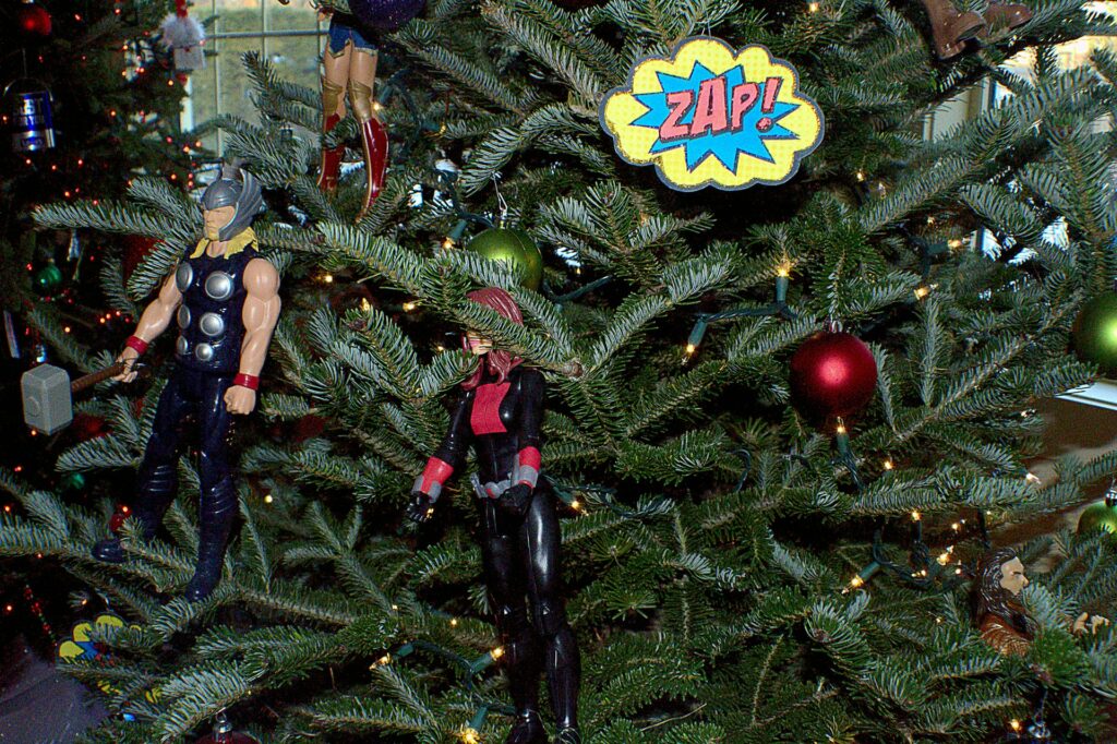 Superhero figurines on Christmas tree
