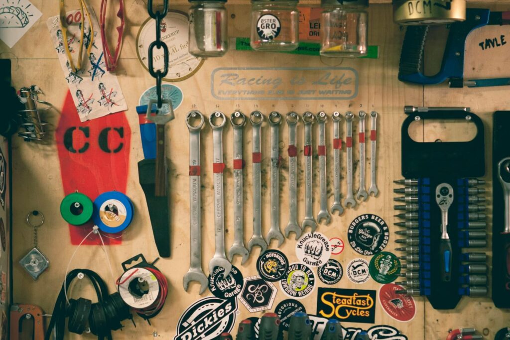 different tools hanging on a board