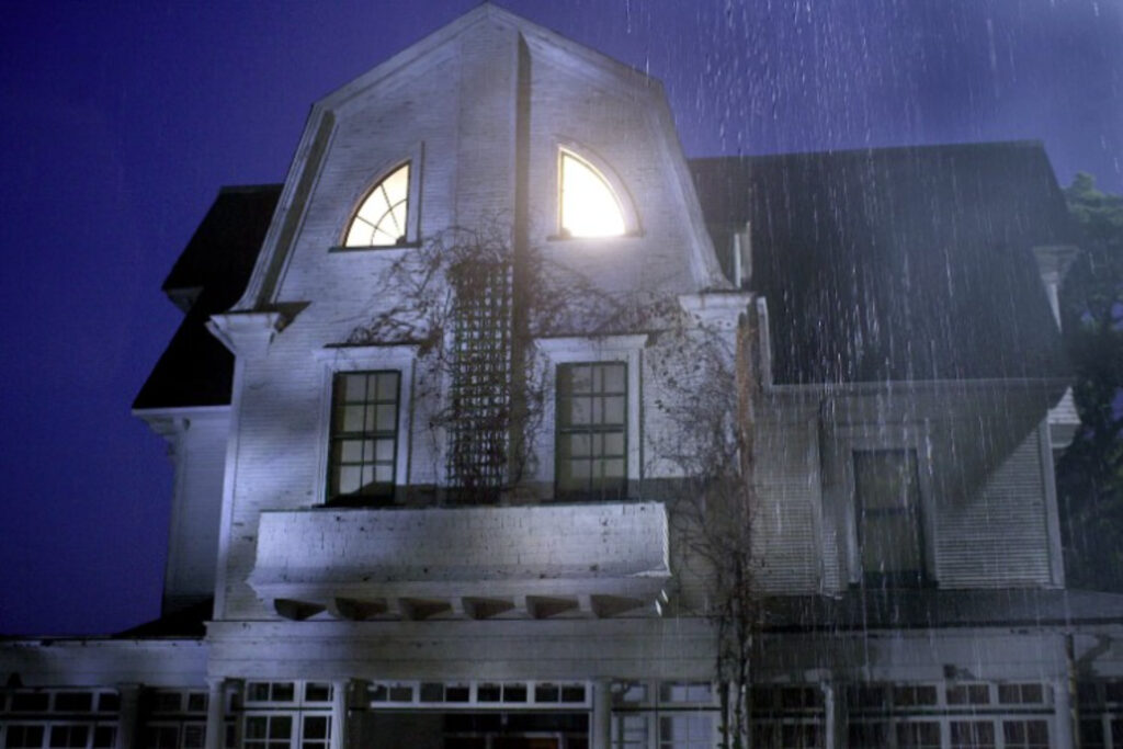 white house with lights in the rain