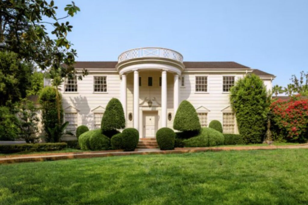 large white house with pillar entrance