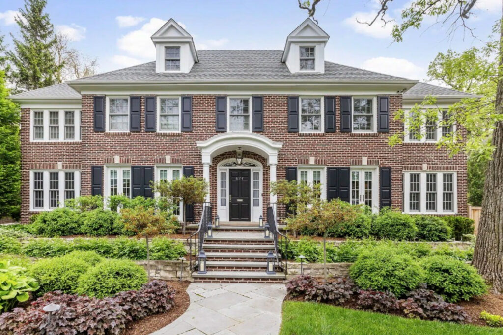 brick house with lots of windows