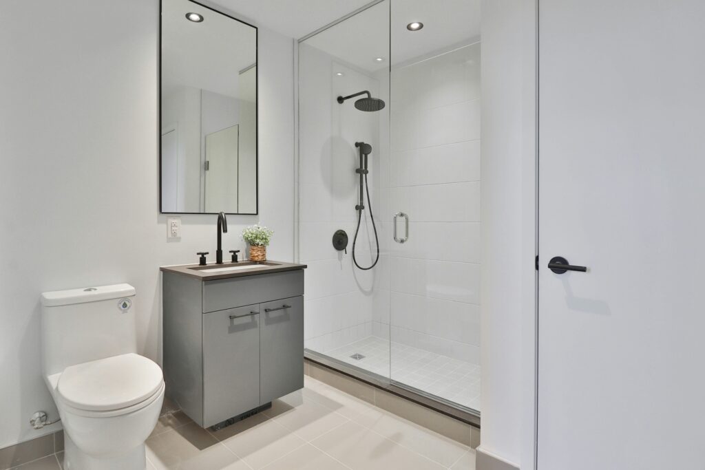 Tucking your walk-in shower in the corner can free up significant bathroom space.