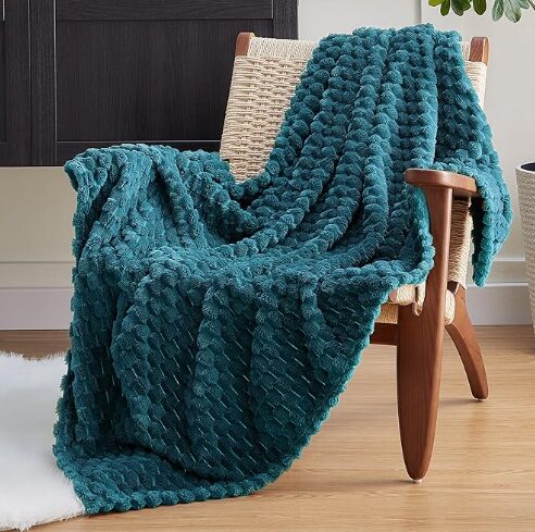 Teal is the 2026 color of the year and this gorgeous throw makes a spring statement.